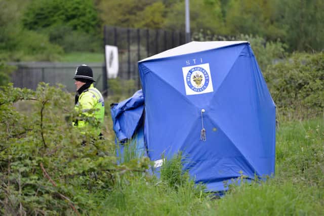 A police tent after the discovery of the body