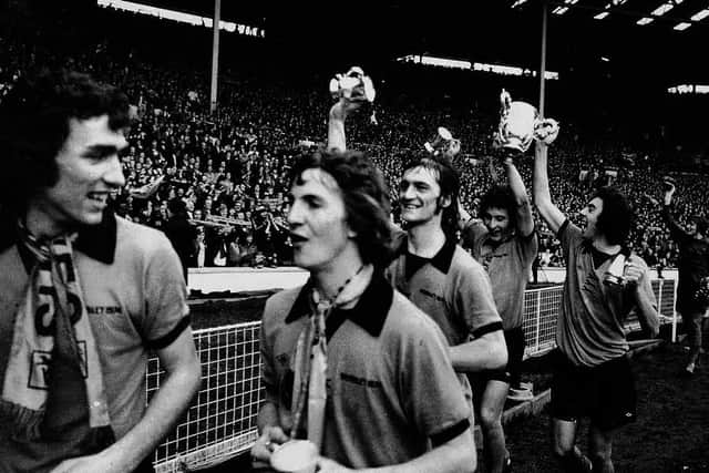 Wolves players parade the trophy