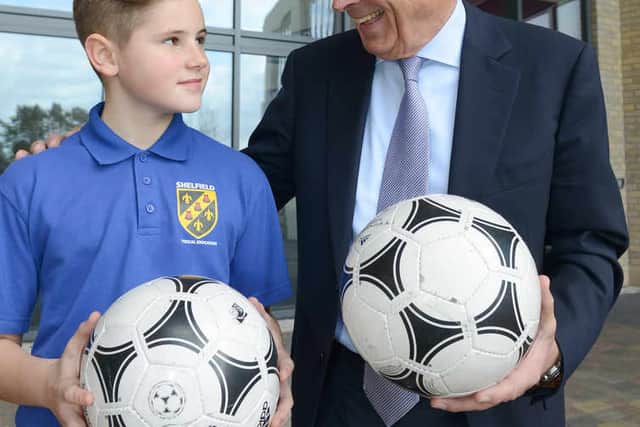 WALSALL COPYRIGHT EXPRESS&STAR TIM THURSFIELD 27/02/15 Former Arsenal chairman David Dein visits Shelfield Academy, Pelsall. Pictured with pupil Ben Watt, aged 12. . (10199651)