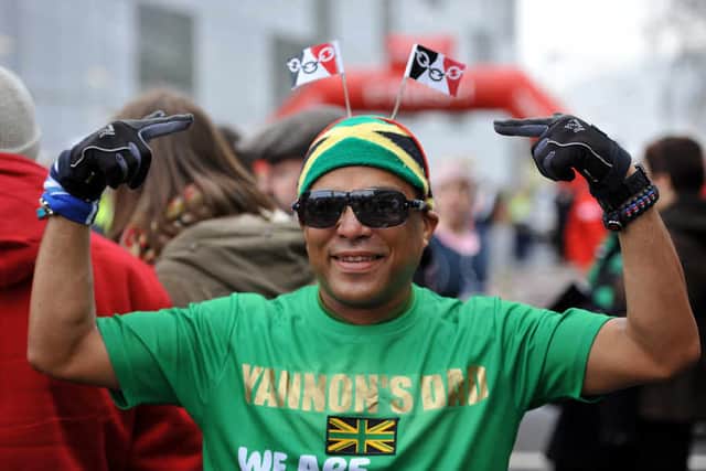 Mark Sinclair wears a hat topped with Black Country flags