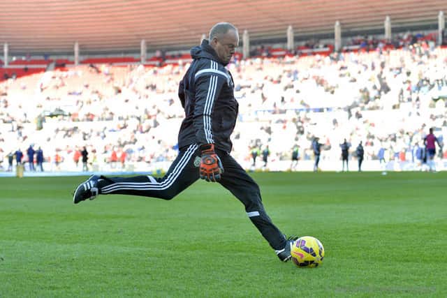 Ready to go - Jonathan Gould gets stuck into training at the Stadium of Light for West Brom.