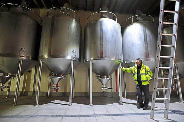 Cheers – Jonothan Holden in the new fermentation plant