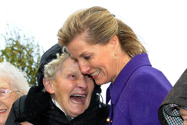 Countess of Wessex shares a joke with land girl Ruth Jordan from Derbyshire.