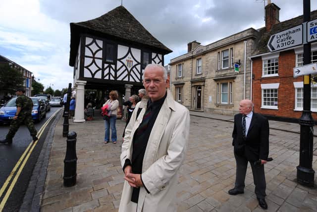 Peter Rhodes in Wootton Bassett in 2009 waiting for the funeral cortege carrying the bodies of eight soldiers killed in Afghanistan.