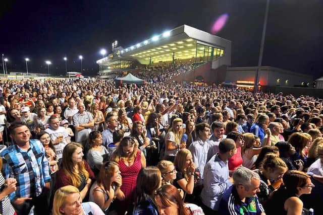 Thousands of Scouting for Girls fans watched the band perform at Wolverhampton Racecourse after an evening's racing