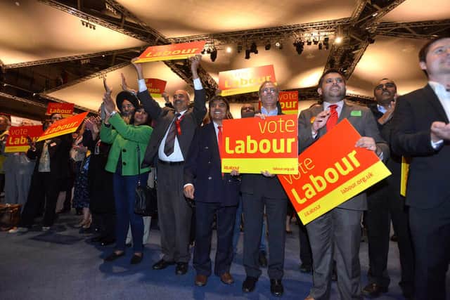 Labour supporters celebrate the win.