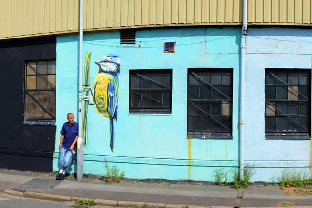 Steve beside his work in Wolverhampton.