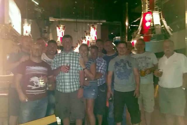 Neil Clulow (front left) pictured with his friends in Spain