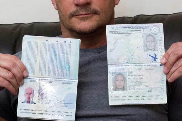 Neil Clulow pictured holding his passport and the passport of his partner Karen Clift, which he used to get to Spain from Birmingham Airport