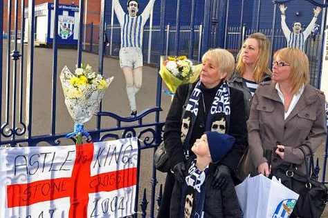 Wife Laraine Astle, daughters Claire Astle and Dorice Mottram and grandson Bradley Pickersgill, aged four, mark the anniversary of Jeff?Astle's death in 2012.