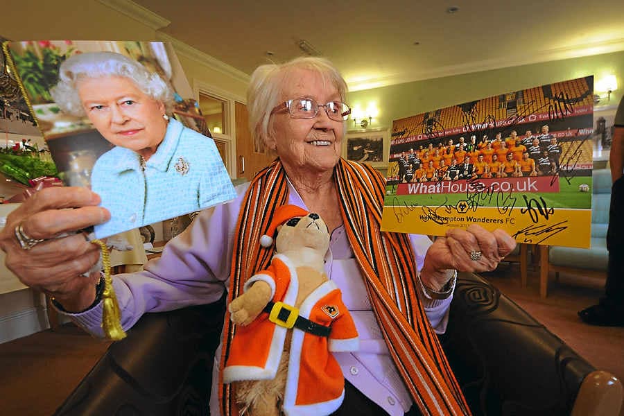 Hilda Rstokes Wolves players make Hilda's 100th birthday with signed photograph