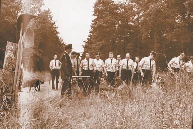 Major operation – police dog handlers search undergrowth in the hunt for Christine's body