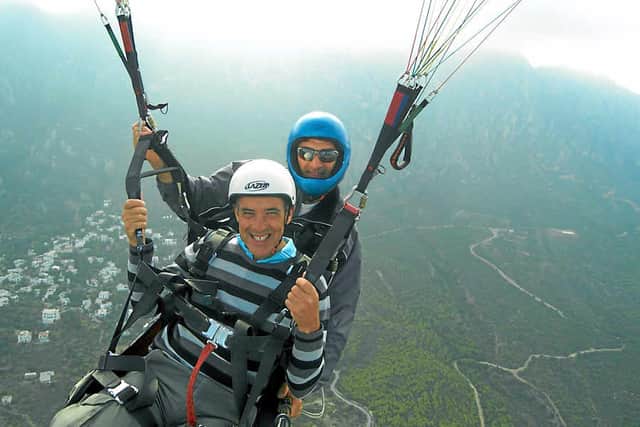 Graham paragliding while celebrating 30 years of marriage