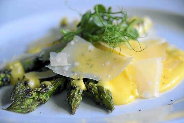The asparagus with hollandaise sauce and shavings of Parmesan