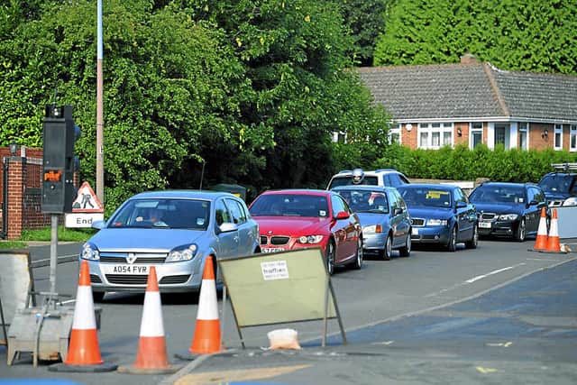 Three-way temporary traffic lights are in use until the end of this month, when roadworks are set to be completed