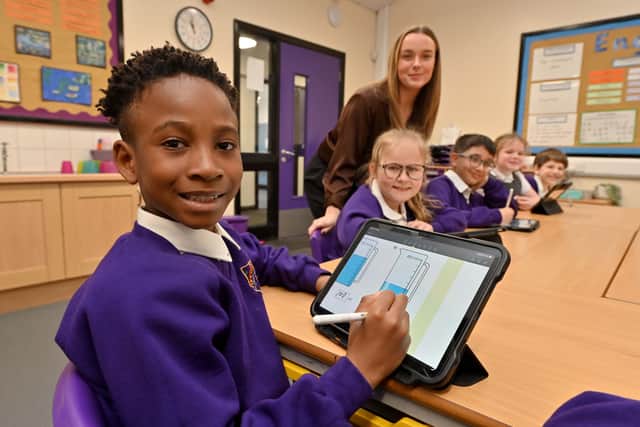 Teacher Danielle Bayliss with pupils