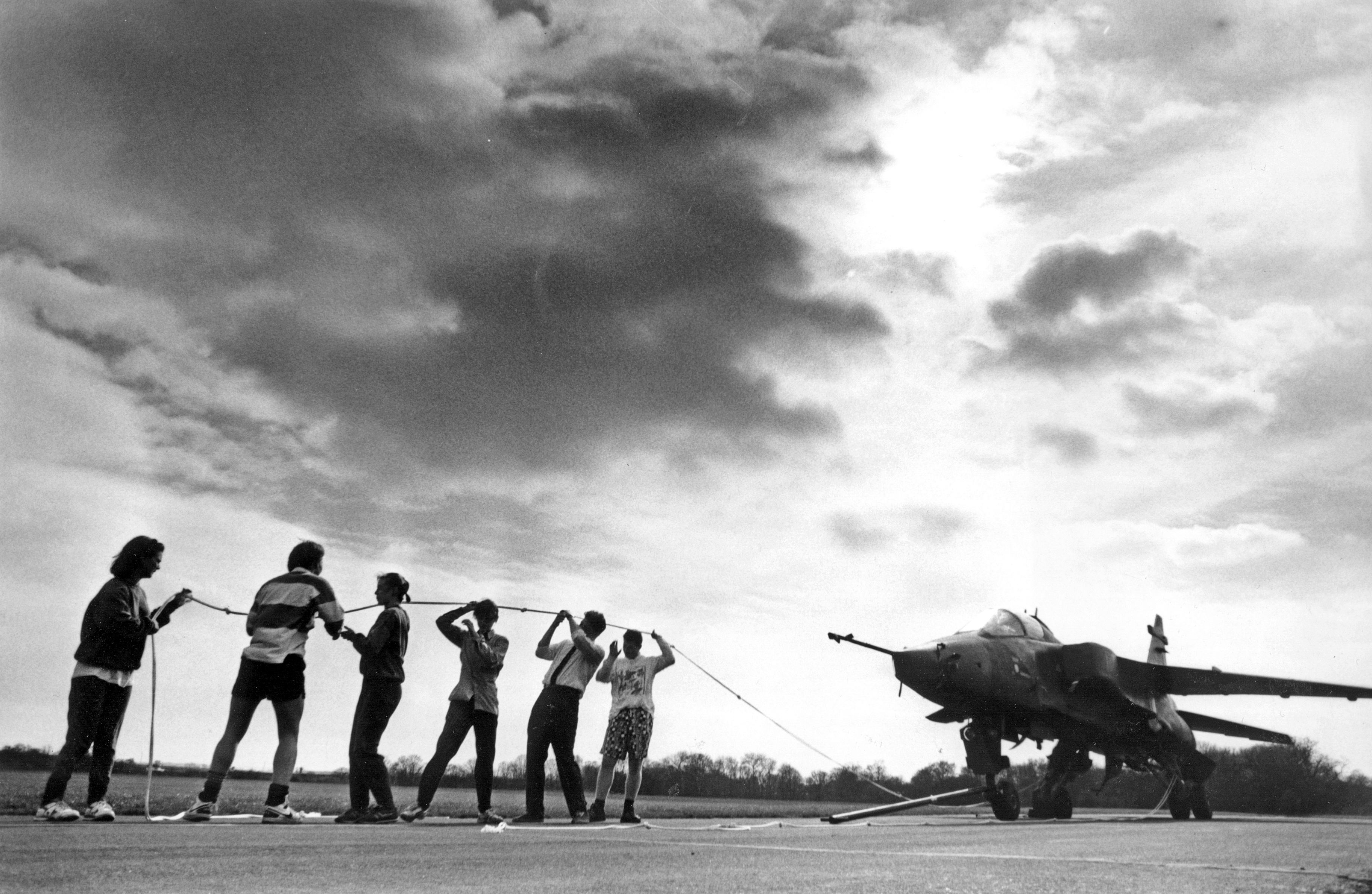 PICTURE FROM THE ARCHIVE: In 1990, sixth-formers at the Royal Wolverhampton School gave their charity appeal a supersonic boost by pitting their strength against a Jaguar jet. More than 20 pupils joined forces to haul the aircraft 500 yards across the tarmac at RAF Cosford in a strongman stunt. The sponsored challenge was the latest in a series of events being held as part of the teenagers’ annual Lenten Appeal.