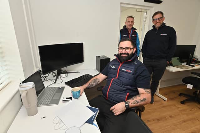 Ian Dunnaker, right, with Callum Crisp, front, and Dean Leonard from Fleetsafe AI, one of the companies based at The Workstore