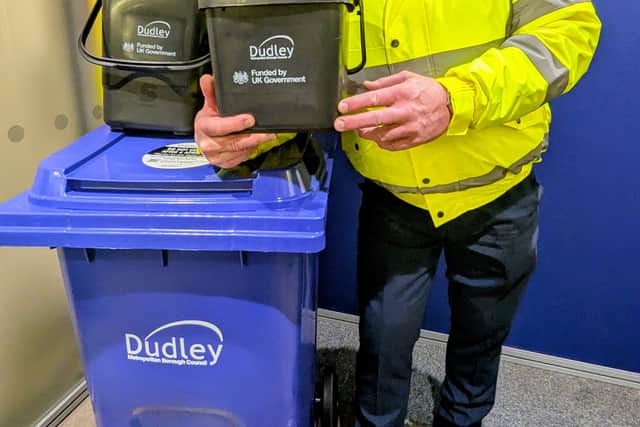 Councillor Damian Corfield with Dudley Council's new recycling bin and caddies for food waste