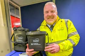 Councillor Damian Corfield with Dudley Council's new recycling bin and caddies for food waste