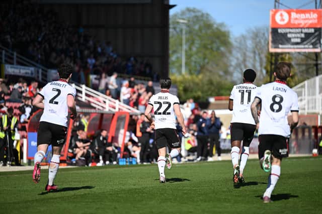 Jamie Jellis celebrates scoring the opening goal for Walsall.