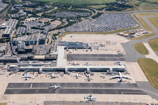 Passengers stuck on planes at Birmingham Airport as fire engines race ...