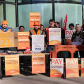 Resident doctors begin their strike outside Queen Elizabeth Hospital in Birmingham. 
