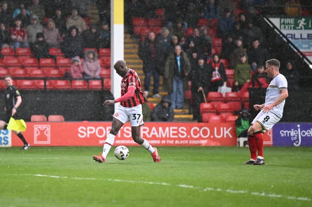 Albert Adomah on the ball during Walsall's clash against Cheltenham Town.