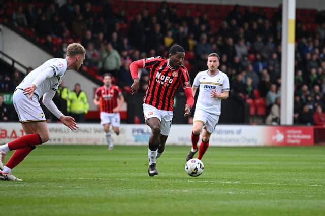 Daniel Kanu rattled a first half chance against the crossbar for Walsall.