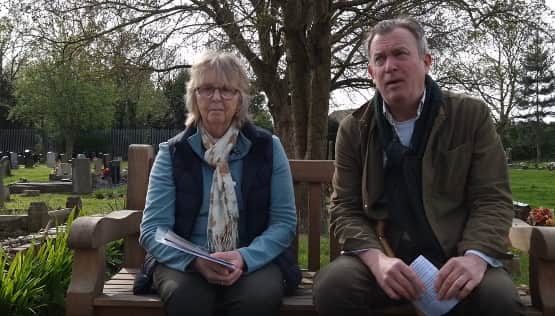 Historians Helen Cook and Robert Bevan Jones outside Holy Trinity Church at Amblecote discussing plans to remember John Corbett