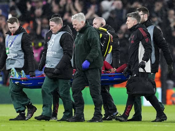 Hugo Ekitike is carried off injured