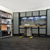 A complete BiGDUG garage setup showing how shelving, cabinets and a workbench can transform a cluttered space into a practical workshop