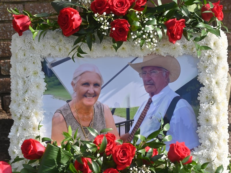 Pictured are funeral flowers outside his home, and traditional Romany Travelling homes he made