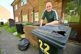 Wayne Pearson is unhappy with the new bin collections at his flat in Four Winds Road, Dudley