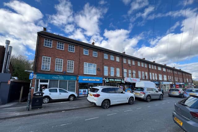 The old veterinary surgery building and adjacent parade of shops in Rubery, south west Birmingham