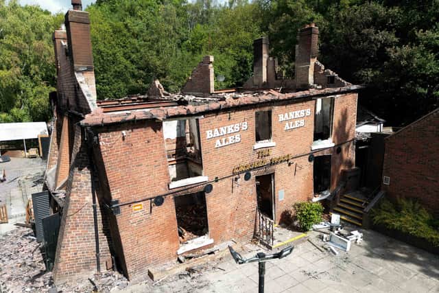 The fire damaged Crooked House before it was bulldozed to the ground