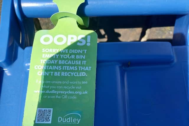 Council operatives have left tags on bins in Greystone Street which were not emptied because incorrect waste had been placed on them