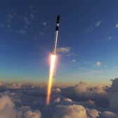 An illustration of an RFA One rocket flying through the sky