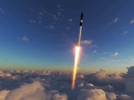 An illustration of an RFA One rocket flying through the sky