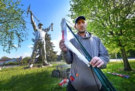 Many of the St George's flags have been torn down from 'Jigger island' in Brownhills. Martin Woodhouse, who originally organised the display finds it petty.