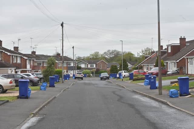 Blue bins awaiting collection in Lyndale Road, Sedgley, the day after they were due to be emptied