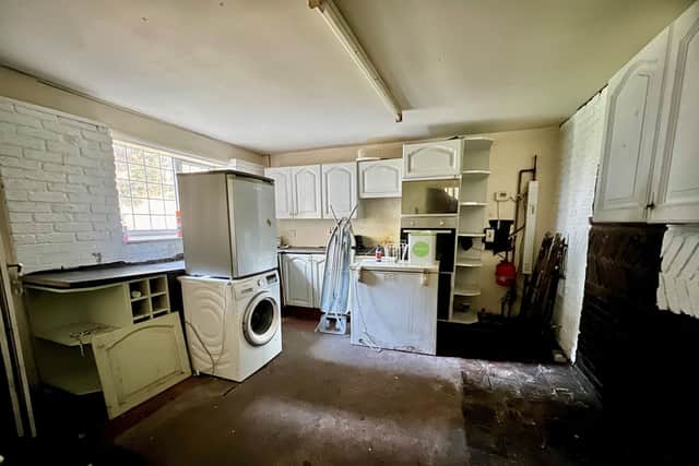 The large kitchen has plenty of amenities for anyone looking to buy the property