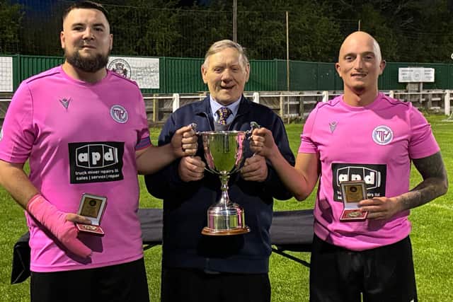 Mental Health Allstars are presented with the CE Yardley Cup by David Yardley, brother of Eddie - who the trophy is named in honour of