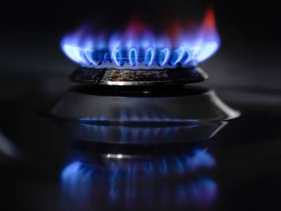 A view of a lighted gas hob