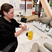 Tania Holland, from Stourton who makes 'posh paper mache' sculptures and paintings