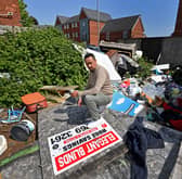 Ali Akbor, who owns a house in Caledon Street, Walsall is angry that fly-tipped rubbish hasn't been cleared for years.