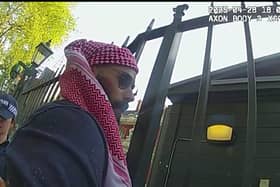 Handout image from the body-worn video footage of police officers issued by the Metropolitan Police showing Abdullah Sabah Albadri being detained outside the Israeli embassy that was shown to the jury at the Old Bailey