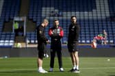 SHEFFIELD, ENGLAND - MAY 2: James Morrison Head Coach of West Bromwich Albion with Leigh Downing Coach of West Bromwich Albion and Damia Abella Statistical Analyst of West Bromwich Albion inspect the pitch after he arrives at the stadium ahead of the Sky Bet Championship match between Sheffield Wednesday and West Bromwich Albion at Hillsborough on May 2, 2026 in Sheffield, United Kingdom. (Photo by Adam Fradgley/West Bromwich Albion FC via Getty Images)