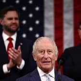 US vice president JD Vance (left) and House Speaker Mike Johnson applaud as the King addresses members of the US House of Representatives and the US Senate