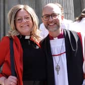 The new Bishop of St Germans in the Diocese of Truro James Treasure poses with his wife Esther after the ceremony